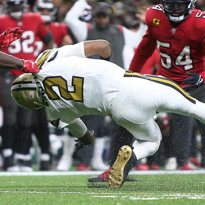 Saints QB Jameis Winston (2) suffers a season-ending knee injury during a 2021 game against Tampa Bay. Credit: Sports Illustrated